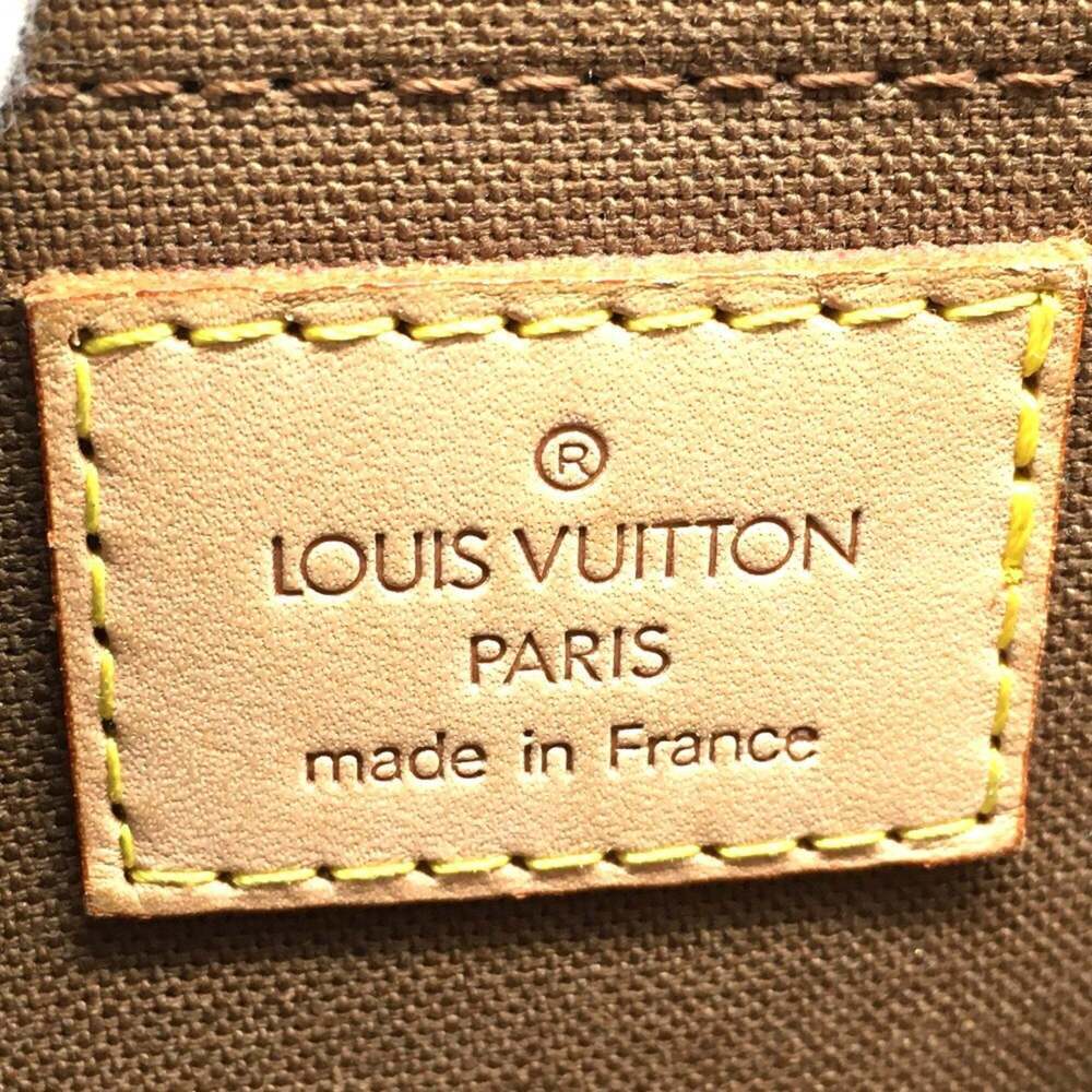 LOUIS VUITTON Brown Monogram Canvas Backpack - Picture 12 of 13